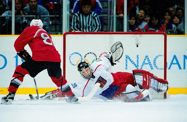 Dominik Hasek making a diving save versus team Canada in the semi finals of the 1998 Winter Olympics Nagano, Japan